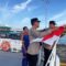 Sambut HUT RI ke-80, Polsek Pelabuhan Tanjungpinang Bagikan Bendera ke Penambang dan Supir Lori